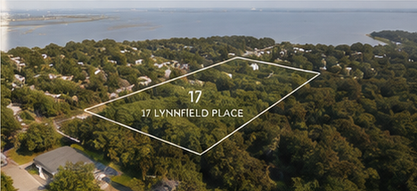 Aerial view of the wooded 17 Lynnfield Place homesite near the water